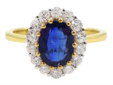 18ct gold oval kyanite and round brilliant cut diamond cluster ring