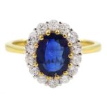 18ct gold oval kyanite and round brilliant cut diamond cluster ring