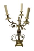 Gilt metal three branch baluster stem table candelabra table lamp with foliage detail