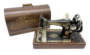 Cased early 20th century Singer hand sewing machine