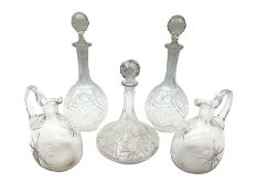 Pair of cut glass decanters and stoppers