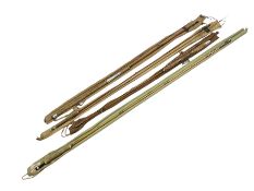 Four vintage split cane fishing rods in cloth bags