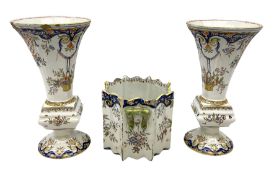 Two French faience polychrome vases and twin handled planter