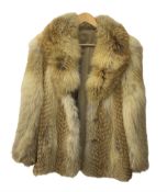 Mid length fox fur coat
