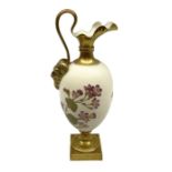 Royal Worcester blush ivory ewer with a satyr mask handle and decorated with floral sprays