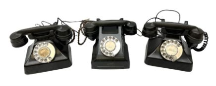Three vintage Bakelite black telephones