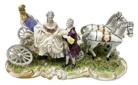 Capodimonte figure group of a horse drawn carriage with two horses pulling an open carriage with a m