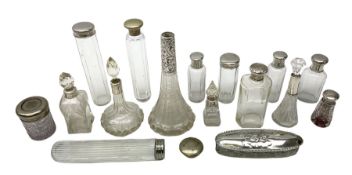Quantity of glass scent bottles and dressing table jars to include seven hallmarked silver collared