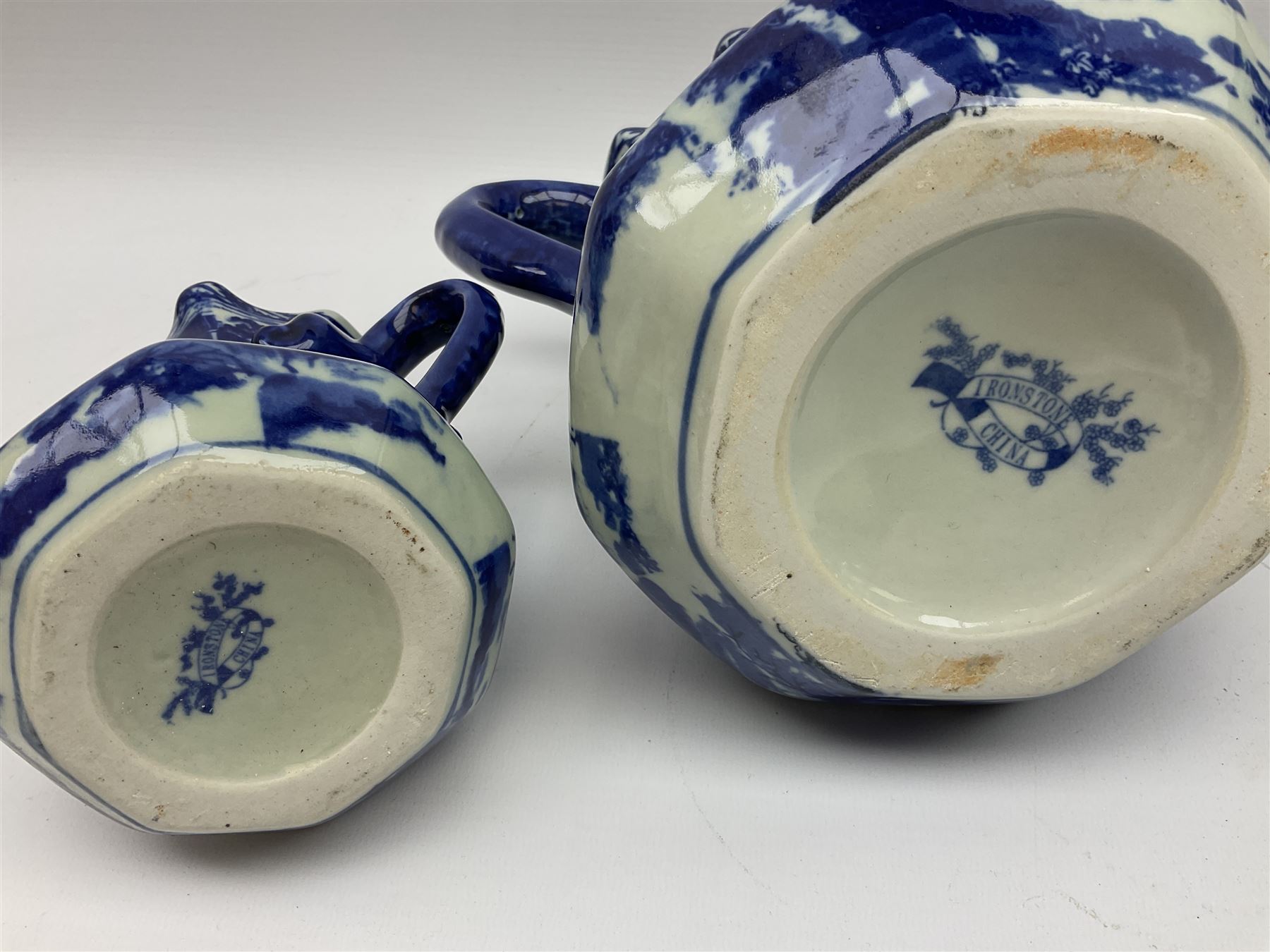 Set of four blue and white ironstone graduated jugs decorated with town scenes - Image 5 of 6