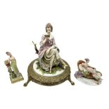 Capodimonte figurine of a lady seated upon a tree stump reading a book