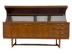 Mid 20th century teak sideboard with sliding glass panels