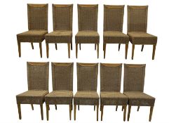 Set of ten light wood and seagrass dining chairs