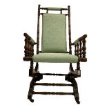 Early 20th century walnut framed American rocking chair