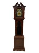 A 20th century three train longcase clock in a mahogany finished case with a swan neck pediment in t