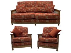 Ercol medium elm framed three seat bergere sofa