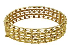 Middle Eastern 19ct gold open work design hinged bangle