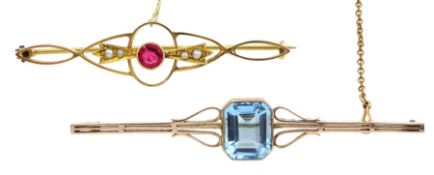 Gold blue stone set brooch and a god pink stone and seed pearl brooch