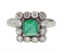 Platinum square cut emerald and diamond cluster ring