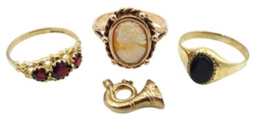 Gold three stone garnet ring