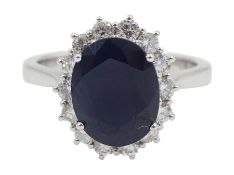 18ct white gold oval sapphire and diamond cluster ring