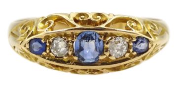 Edwardian 18ct gold three stone sapphire and two stone diamond ring