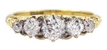 Early 20th century gold graduating five stone old cut diamond ring