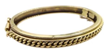 Early 20th century 15ct gold hinged bangle
