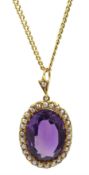 Late 19th/early 20th century gold oval amethyst and seed pearl cluster pendant