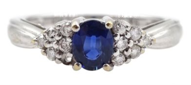18ct white gold oval sapphire and diamond cluster ring