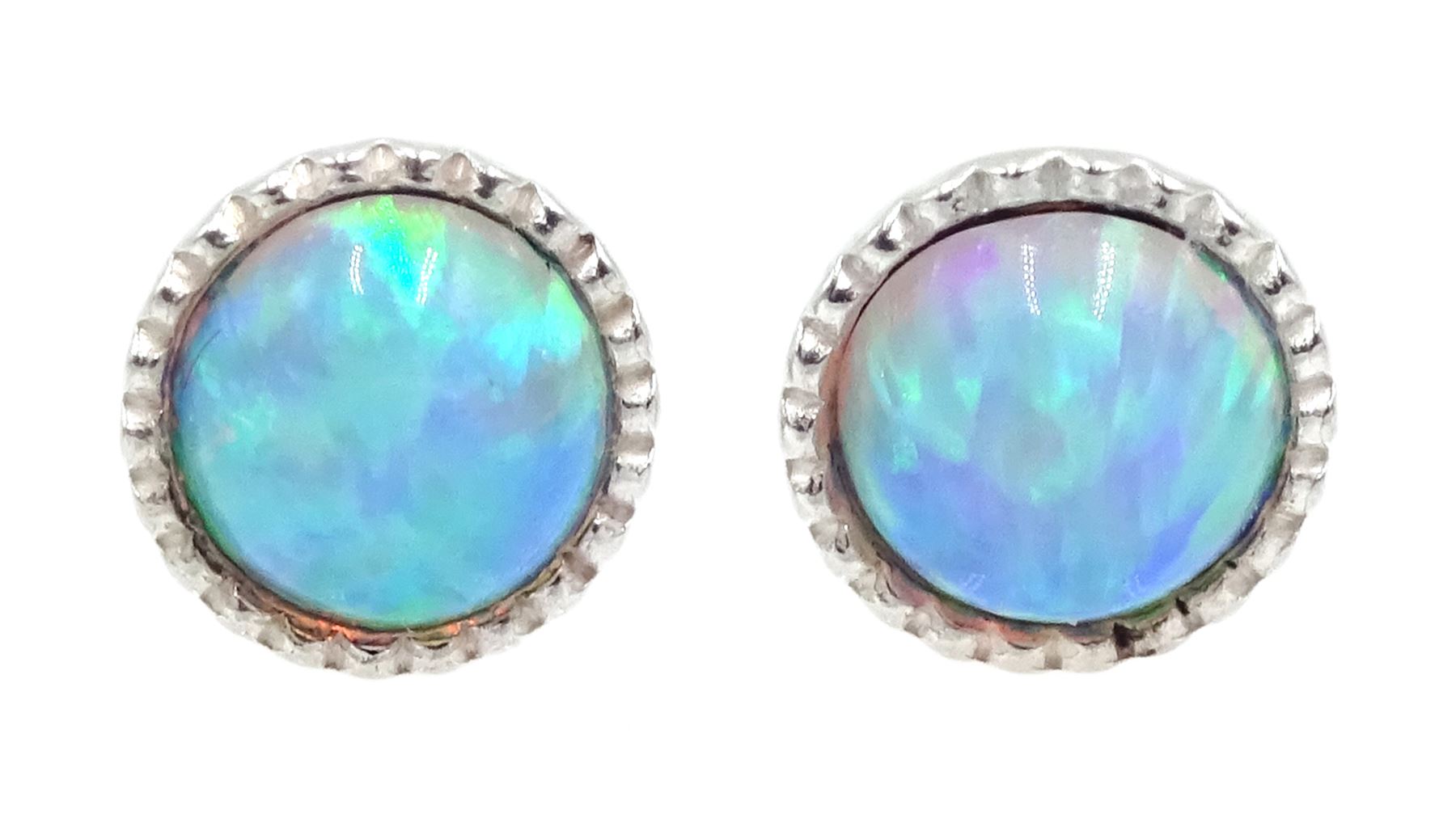 Pair of silver round opal earrings