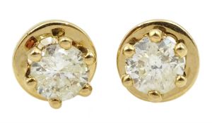 Pair of 18ct gold round brilliant cut diamond stud earrings