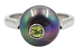 Platinum single stone cultured grey pearl and peridot ring