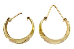 Pair of 18ct gold hoop earrings with textured rose and yellow gold decoration