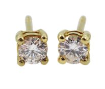 Pair of 18ct gold single stone round brilliant cut diamond stud earrings