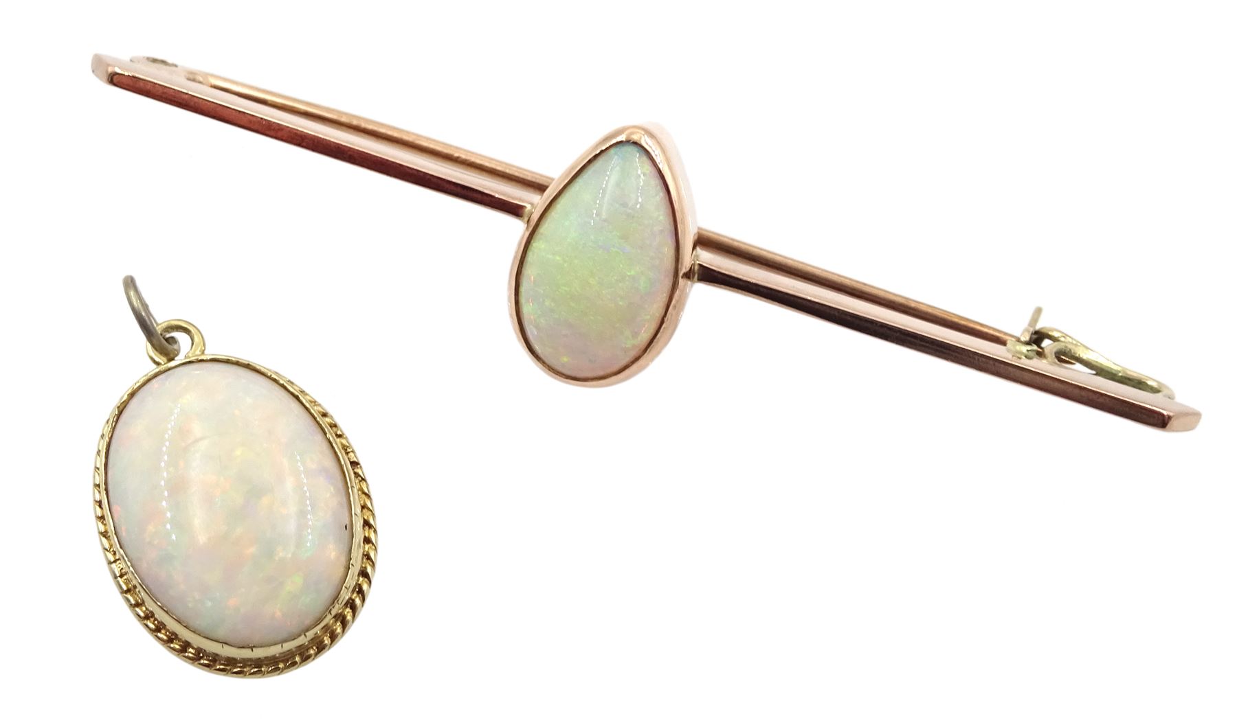 Early 20th century 9ct rose gold pear shaped opal bar brooch and an oval opal pendant