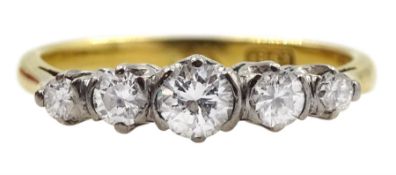 Gold graduating five stone diamond ring