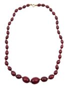 Single strand graduated oval cherry amber bead necklace