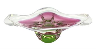 Art glass pink and green dish with white lined rim