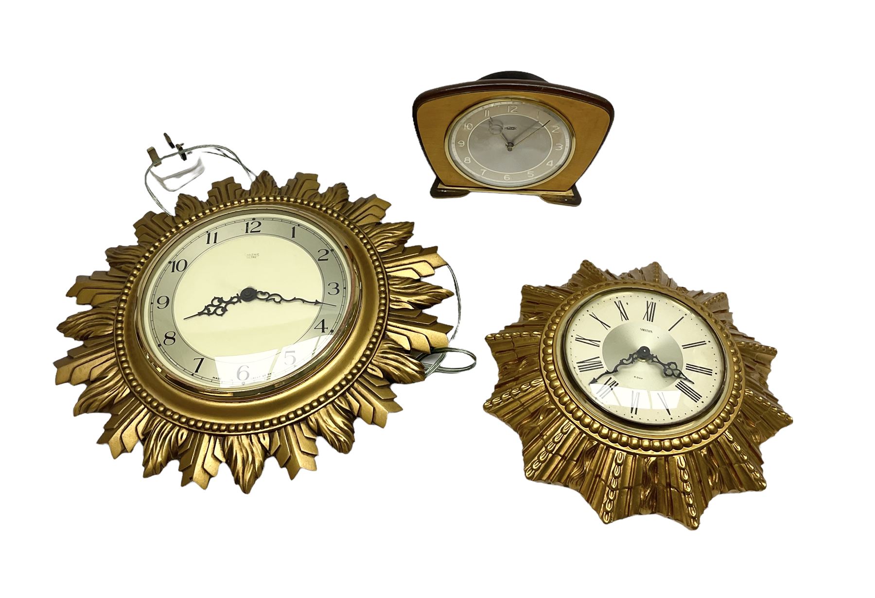 Two Smiths Sectric gilt sunburst wall clocks together Metamec Dereham wooden mantel clock