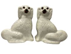 Pair of Staffordshire style dogs with glass inset eyes