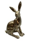 Composite bronzed model of a sitting hare