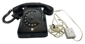 Black Bakelite telephone with rotary dial
