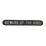 Cast iron sign 'Beware of the Kids'