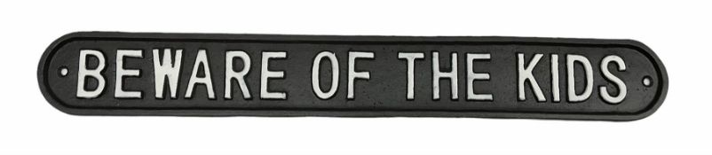 Cast iron sign 'Beware of the Kids'