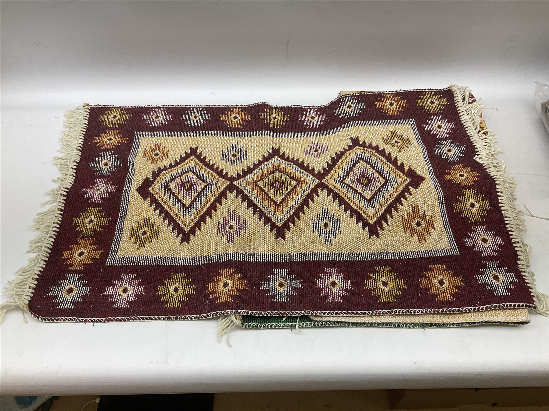 Three Turkish rugs decorated with geometric medallions and tasseled edges - Image 2 of 4