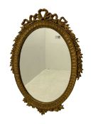 Oval gilt framed wall mirror
