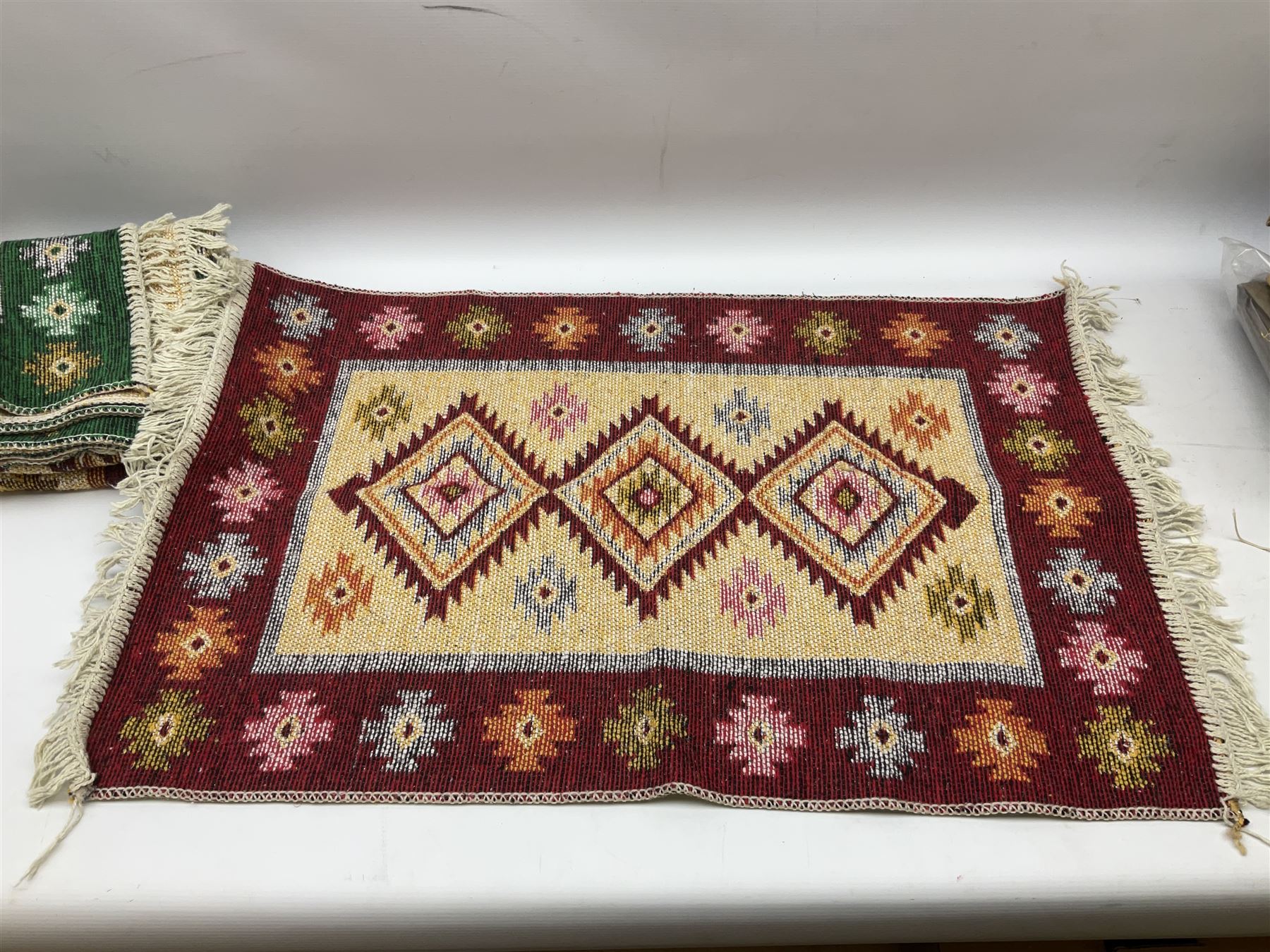 Three Turkish rugs decorated with geometric medallions and tasseled edges - Image 3 of 4