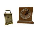 Battery driven marble mantel clock in the Art Deco style and a brass finished carriage clock. Both w