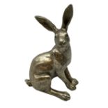 Composite bronzed model of a sitting hare