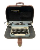 Imperial typewriter in brown leather carrying case
